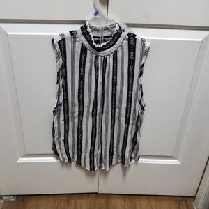 Short sleeve multicolored blouse (off white, tan and black stripes).